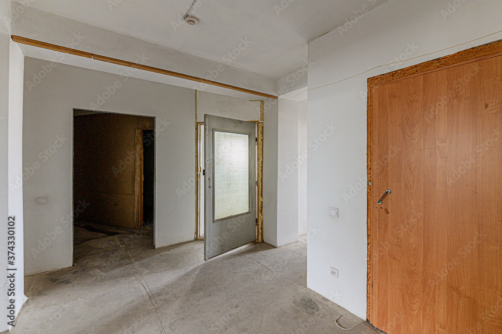 Russia, Moscow- February 15, 2020: interior room rough repair for self-finishing. interior decoration, bare walls of the premises, stage of construction Russia, Moscow- February 15, 2020: interior room rough repair for self-finishing. interior decoration, bare walls of the premises, stage of construction