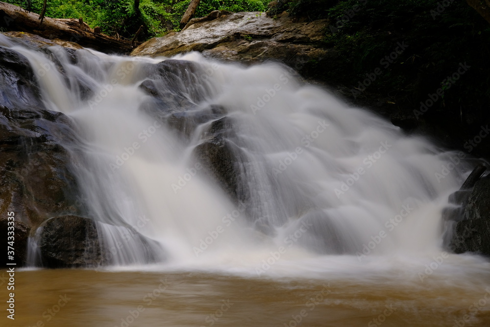 Obraz premium small waterfall in the forest