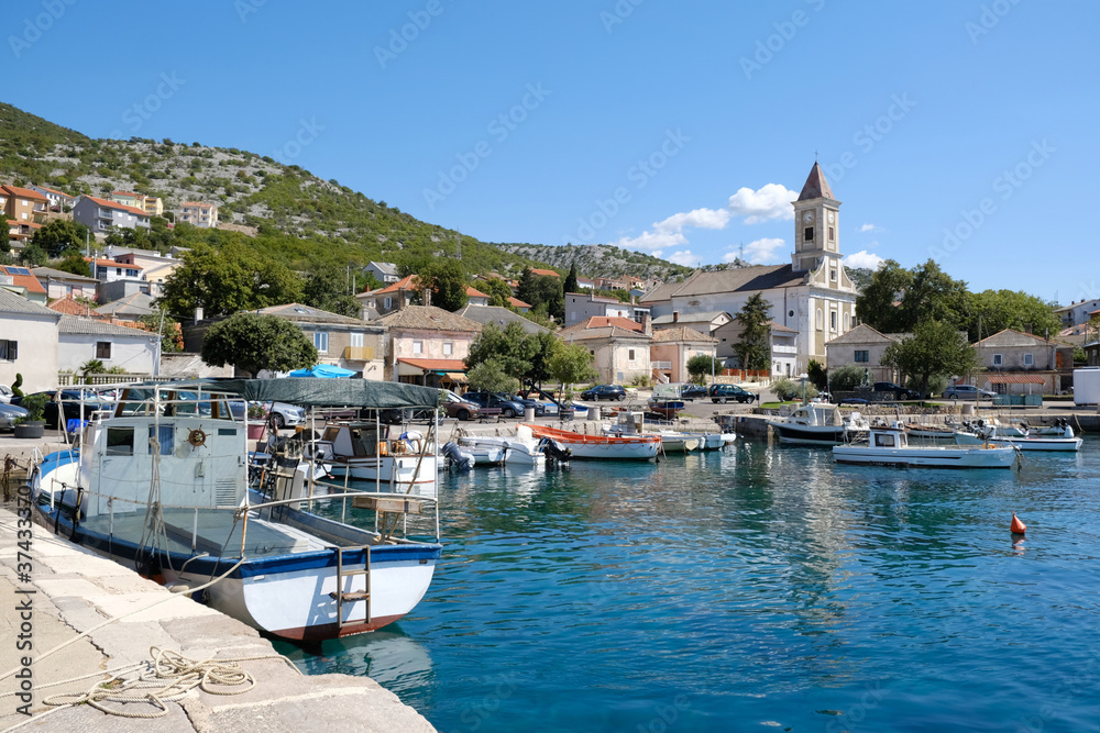 Beautiful view of Sveti Juraj, Croatia. A small quiet port village on the Adriatic with crystal clear water.