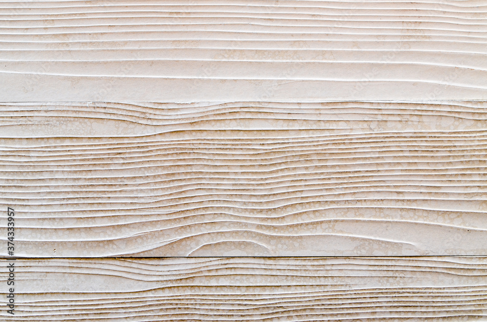 The plank has a pattern and a rough, rough, striped texture, painted white, beautifully used in the construction of houses and buildings.