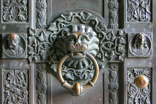 Lion head door knocker made of brass at Hohenzollern Castle, Germany