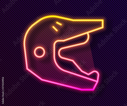 Glowing neon line Motocross motorcycle helmet icon isolated on black background. Vector Illustration.