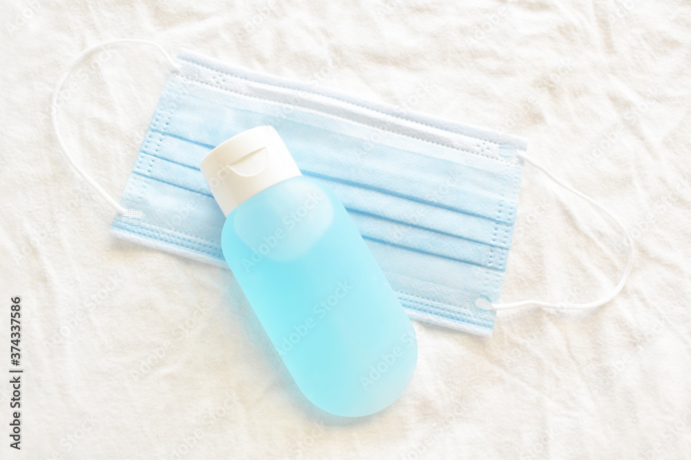 Hand sanitizer and medical mask or surgical mask. Hand sanitizer and medical mask or surgical mask.