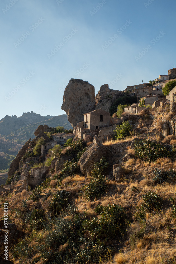 The abandoned village of Pentedattilo at sunset. Aspromonte, Calabria, Italy.