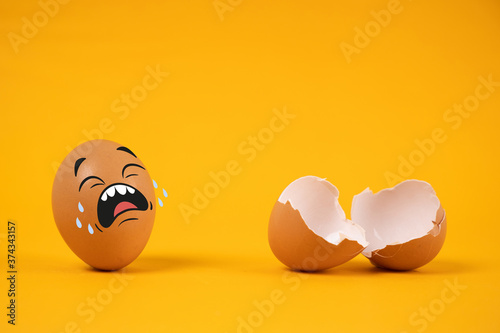 eggs with facial expressions on a yellow background.