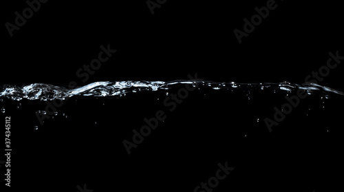 water waves splash and bubbles isolated on black background