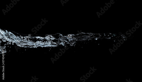 water waves splash and bubbles isolated on black background