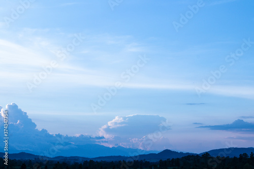  White fluffy Clouds Against Blue Sky On Sunshine Day For Backdrop Background