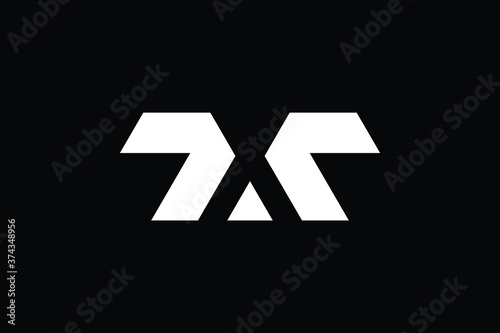 Free Download MT letter logo design on luxury background. TM monogram initials letter logo concept. MT icon design. TM elegant and Professional letter icon design on black background. T M MT TM - GFXLoad