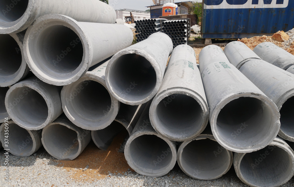 KUALA LUMPUR, MALAYSIA -MAY 13, 2020: Concrete culvert at construction site. The material is shipped by the manufacturer and is ready for installation. Made of reinforced concrete
KUALA LUMPUR, MALAYSIA -MAY 13, 2020: Concrete culvert at construction site. The material is shipped by the manufacturer and is ready for installation. Made of reinforced concrete
