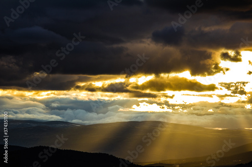 Sun breaking through the clouds © Christian