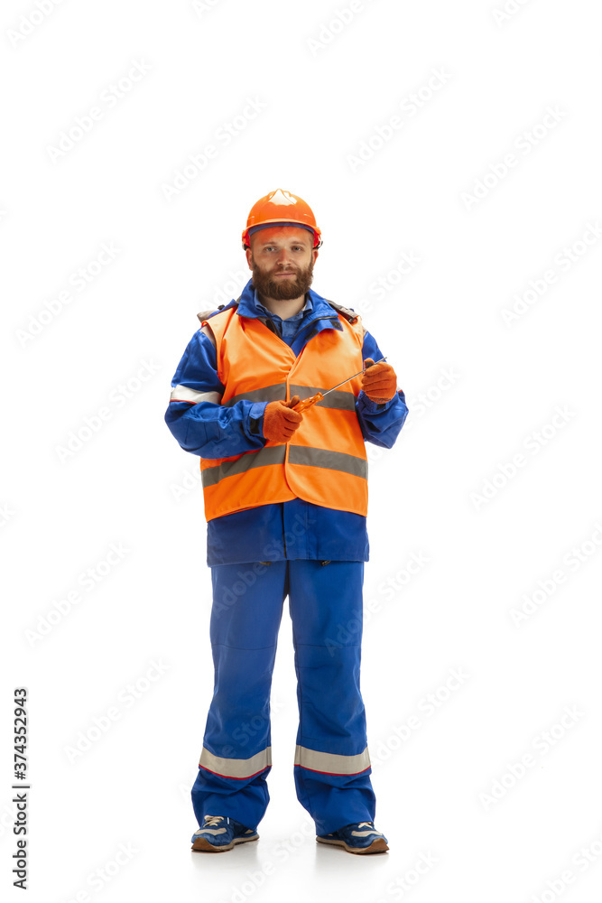 Handsome contractor, builder isolated over white studio background. Concept of professional occupation, work, job, building, investment. Copyspace for ad, text. Caucasian man wearing equipment. Handsome contractor, builder isolated over white studio background. Concept of professional occupation, work, job, building, investment. Copyspace for ad, text. Caucasian man wearing equipment.