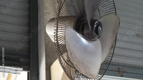 4K Old dirty and dusty electric fan blowing by wind as vintage scene.