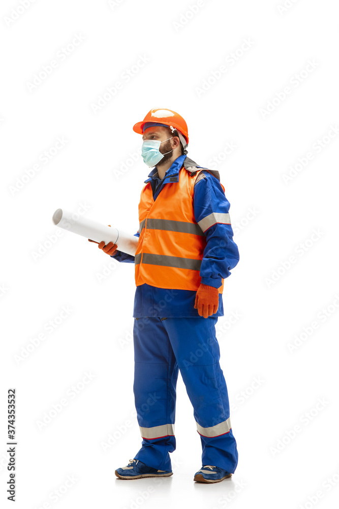 Handsome contractor, builder isolated over white studio background. Concept of professional occupation, work, job, building, investment. Copyspace for ad, text. Caucasian man wearing equipment. Handsome contractor, builder isolated over white studio background. Concept of professional occupation, work, job, building, investment. Copyspace for ad, text. Caucasian man wearing equipment.