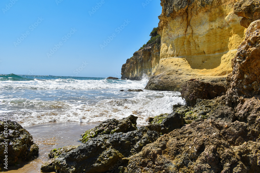 Rocks and waves in the Mediterranean Sea, Cala fonda, Tarragona.