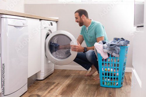 Man doing laundry at home