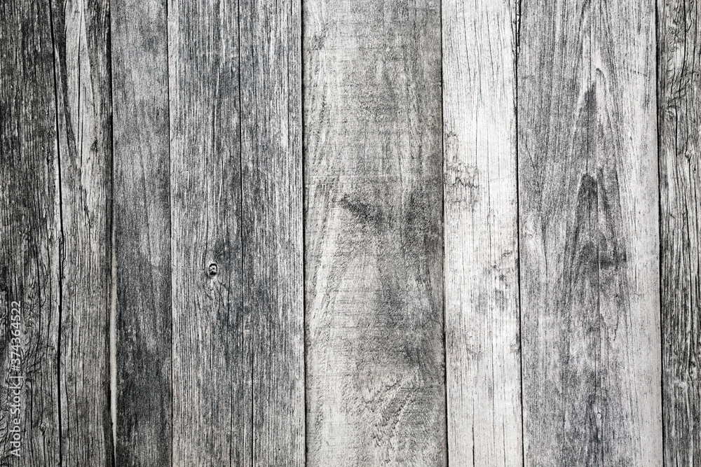 Rustic wooden planks forming an abstract background. Grunge textured surface. Rustic wooden planks forming an abstract background. Grunge textured surface.