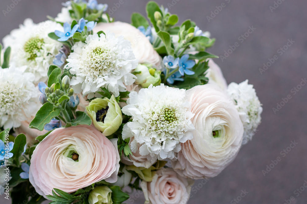 Bouquet of flowers with Ranunculus, anemones close-up Bouquet of flowers with Ranunculus, anemones close-up