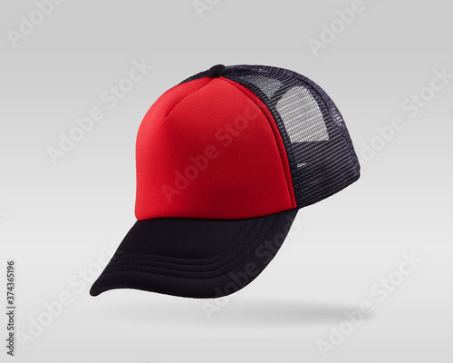 Red and black baseball cap isolated on white background. photo