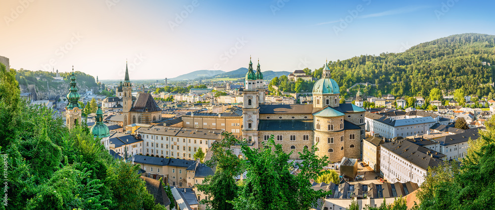 the historic city of salzburg while sunset - obrazy, fototapety, plakaty 