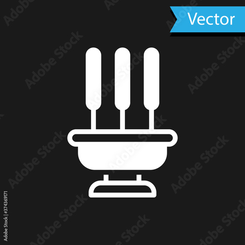 White Burning aromatic incense sticks icon isolated on black background. Vector.