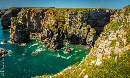 The impressive stacks and stumps along the Pembrokeshire coast, Wales in early summer photo