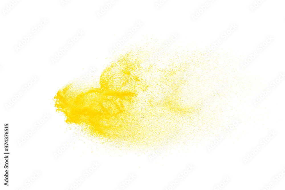 Obraz premium Yellow powder explosion isolated on white background.
