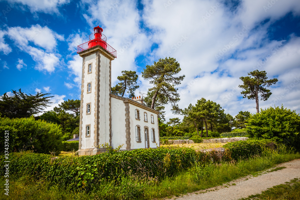 Historic lighthouse at the harbour of Benodet in Brittany, France