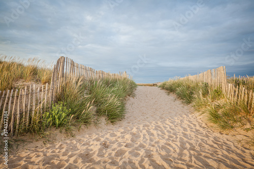 Wooden Fence at a sandy beach in Brittany, France
