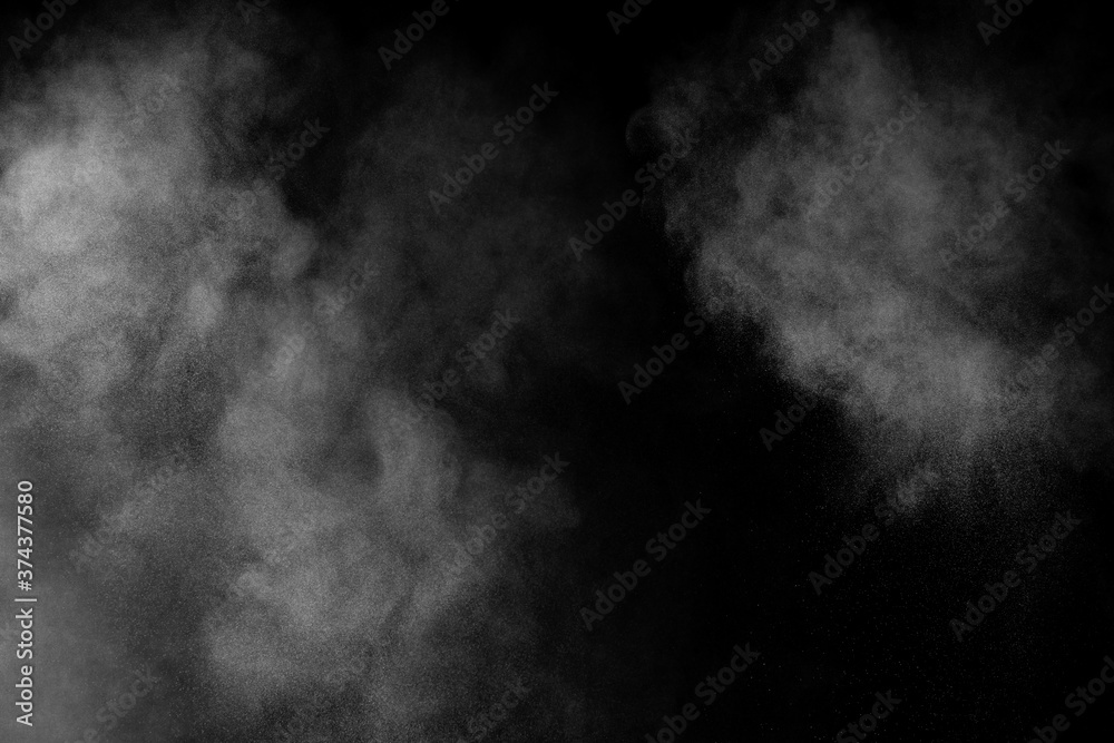 Fototapeta White powder explosion on black background.
