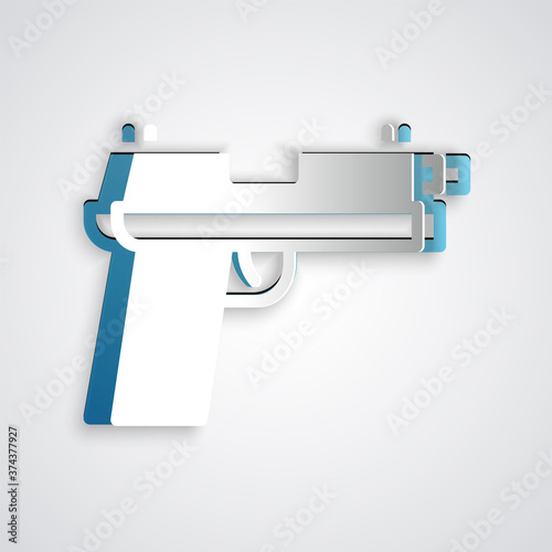 Paper cut Pistol or gun icon isolated on grey background. Police or military handgun. Small firearm. Paper art style. Vector.