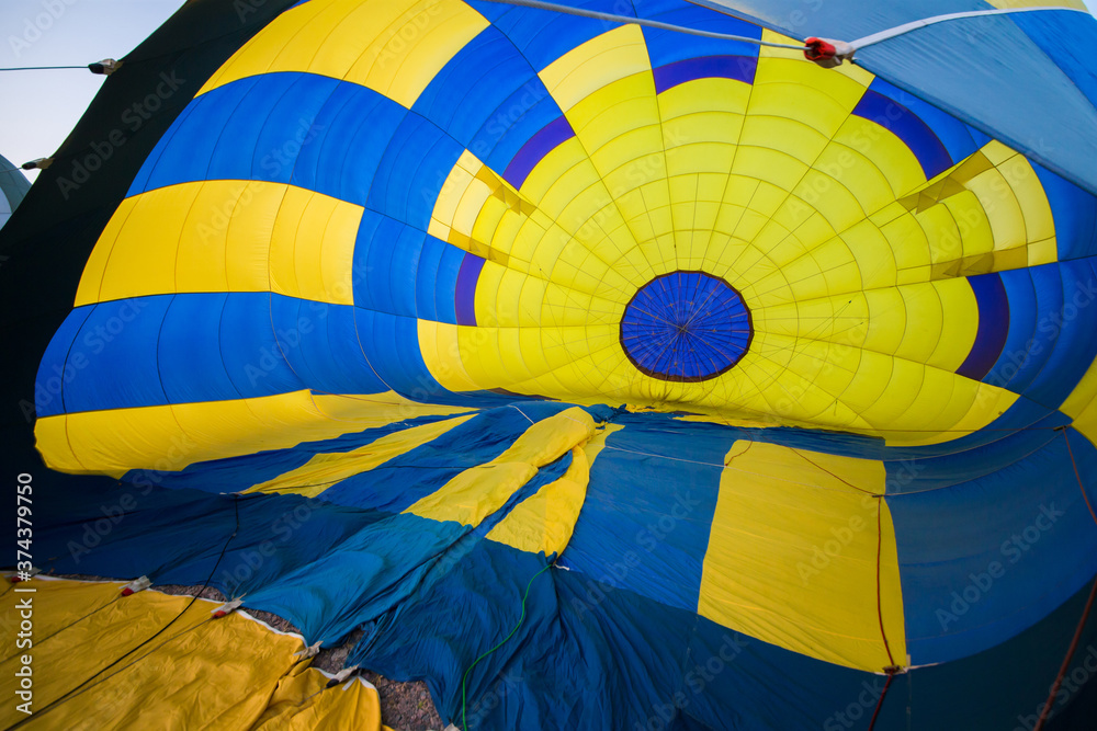 Fototapeta premium A large balloon lies on the ground