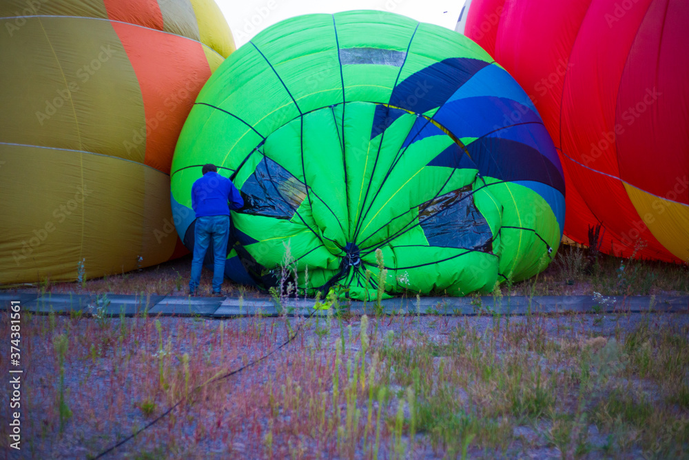 Fototapeta premium A large balloon lies on the ground