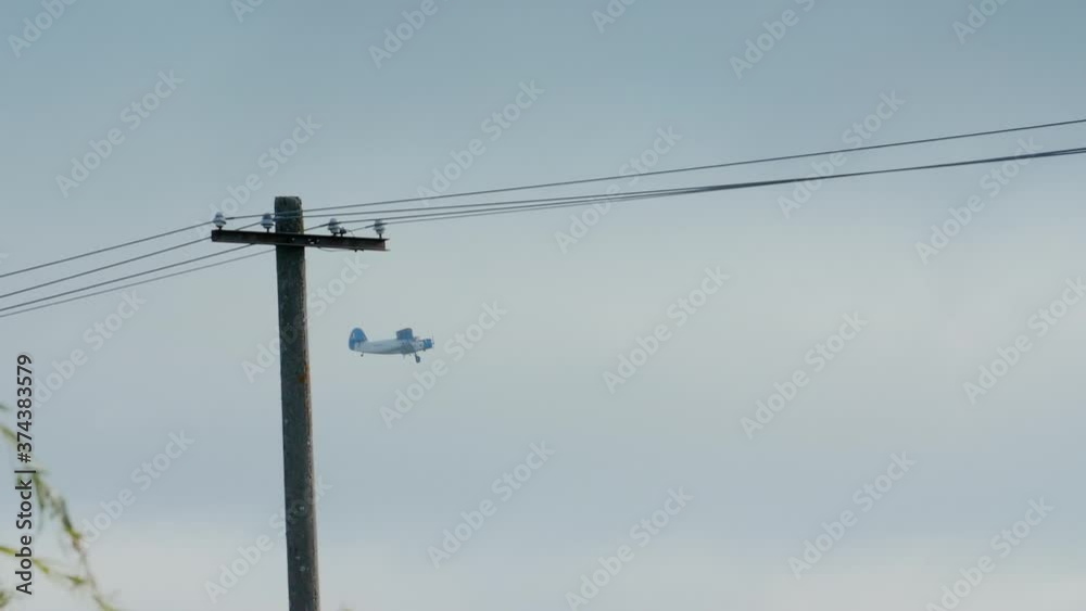 Agriculture biplane flying - super slow motion Agriculture biplane flying - super slow motion