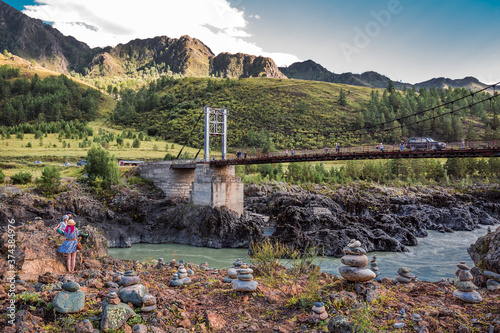 Mountain landscape with a bridge over the Katun river. Altai republic photo