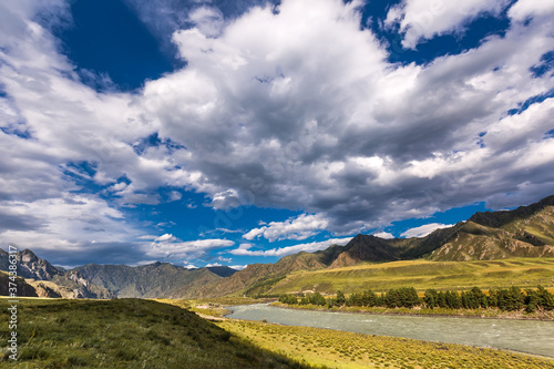 Mountain landscape with river and clouds. altai republic