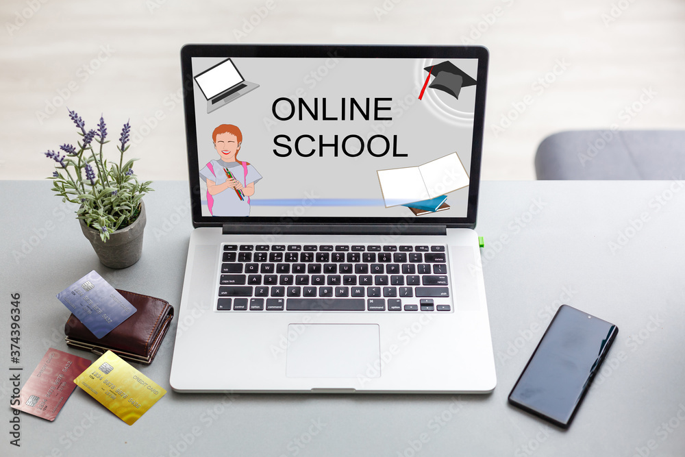 e-learning concept: online school on a laptop screen. Screen graphics are made up. e-learning concept: online school on a laptop screen. Screen graphics are made up.