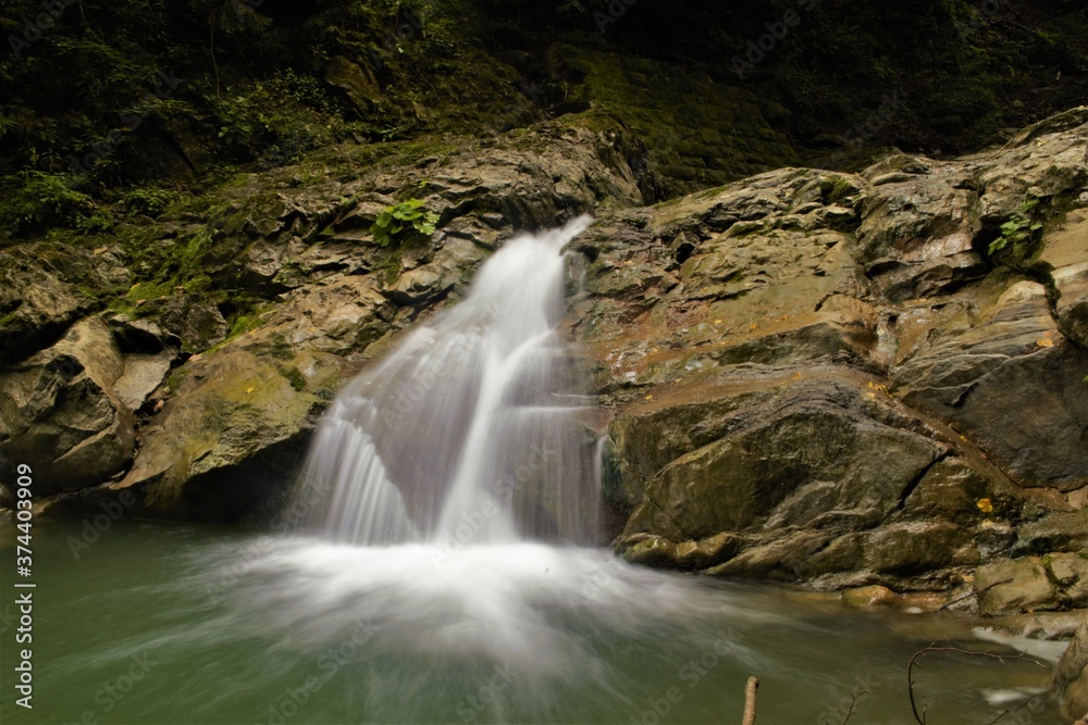 fabulous waterfall in the mountains
fabulous waterfall in the mountains