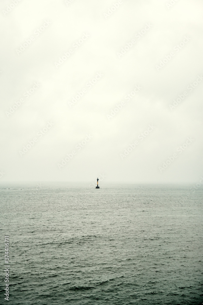 Fototapeta premium Lone Buoy on a Cloudy Day