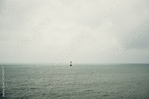 Lone Lighthouse on a Cloudy Day