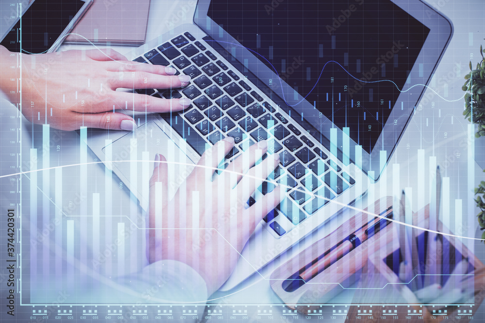 Multi exposure of woman hands typing on computer and forex chart hologram drawing. Stock market analysis concept. Multi exposure of woman hands typing on computer and forex chart hologram drawing. Stock market analysis concept.