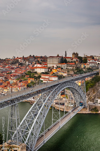 European Travel Places. Porto Cityscape at Daytime with Dom Luis I Bridge in Foregounrd in Portugal.