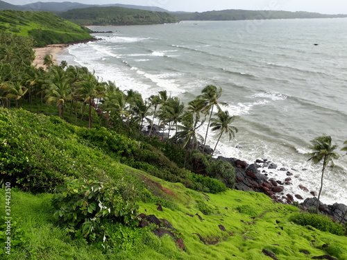 beach in the morning, over view in the Indian Ocean beach,  green beach in goa, 