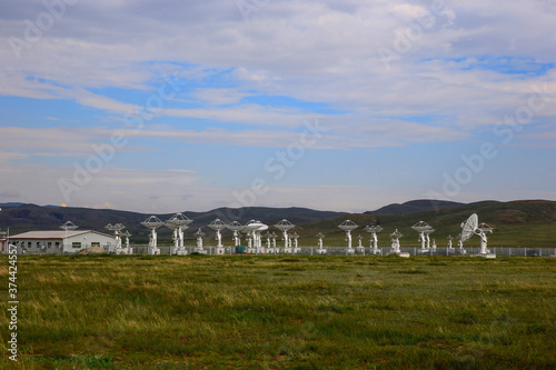Radio telescope observatory and the blue sky white clouds