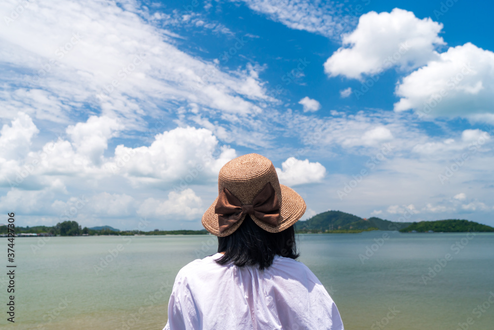Fototapeta premium Woman travel around the world with backpack freedom and relax life.