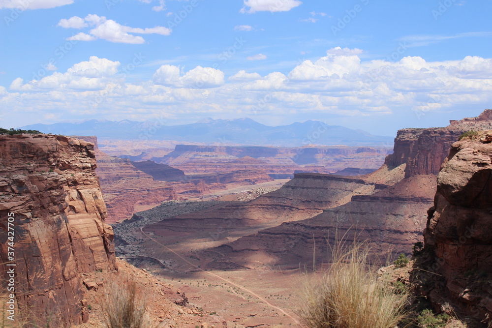 Amazing view of Canyonlands National Park, Utah with the Colorado Rockies in the background. Views only comparable to Mars. 