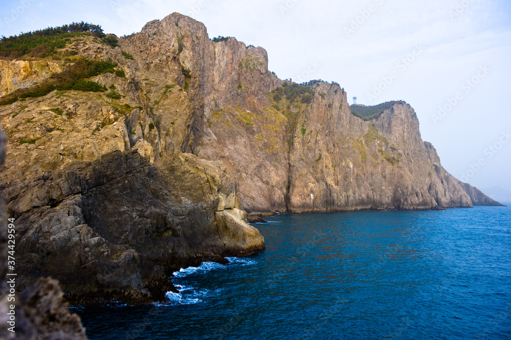 The beautiful landscape of sea side and rock beach.