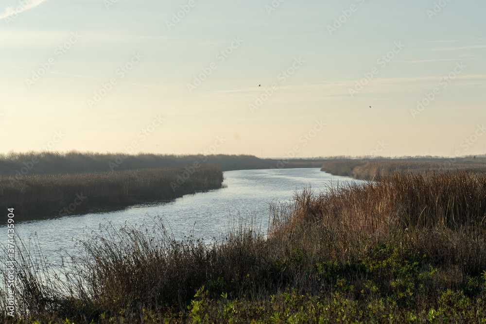 Wooden fence on a field / Sunset on the beach / sunset over the river Wooden fence on a field / Sunset on the beach / sunset over the river