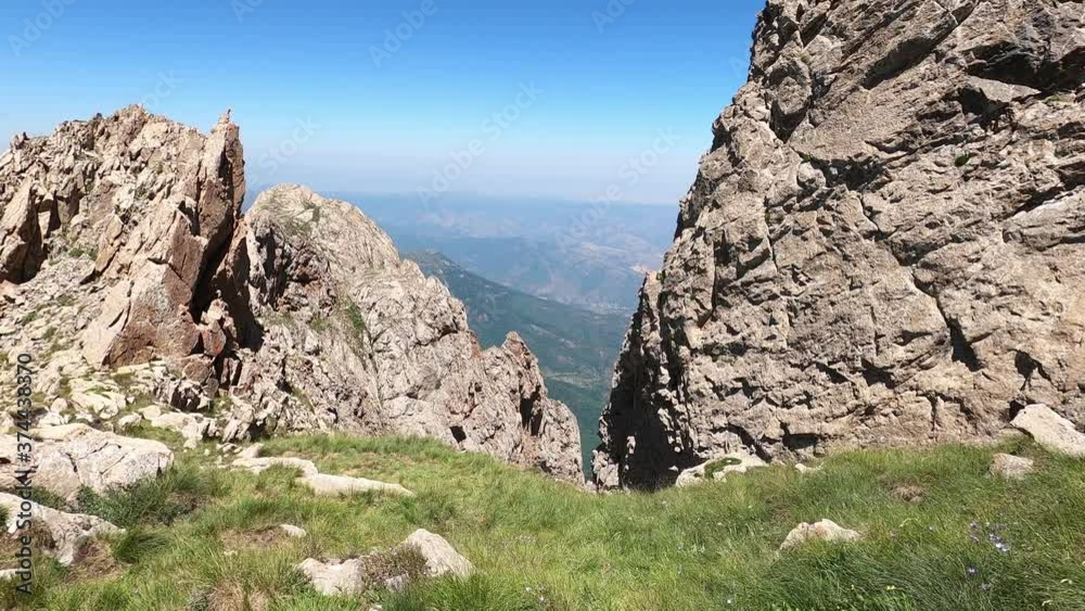View from top of Khustup mountain, Syunik province, Armenia. View from rocks to the mountains,blue sky. View from top of Khustup mountain, Syunik province, Armenia. View from rocks to the mountains,blue sky.