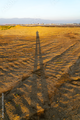 Wooden fence on a field / Sunset on the beach / sunset over the river